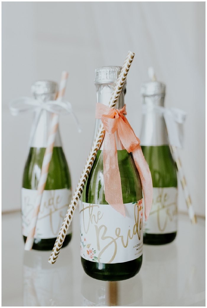 Bride and bridesmaid champagne bottles 