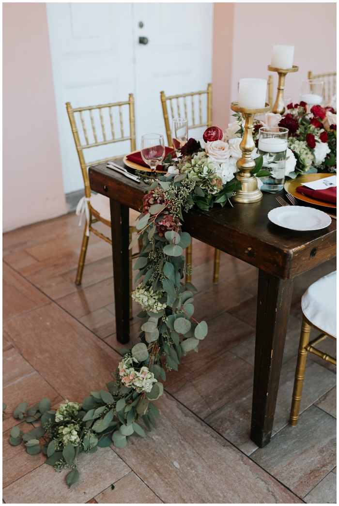 greenery cascading over reception table 